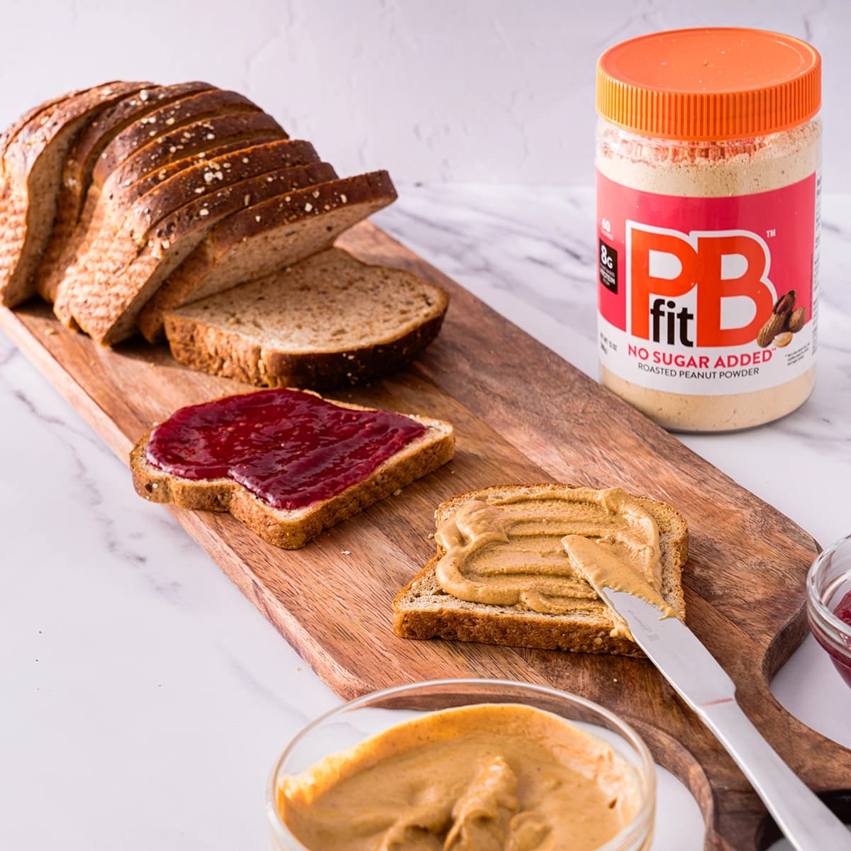 PBfit no sugar added on an open PB and J